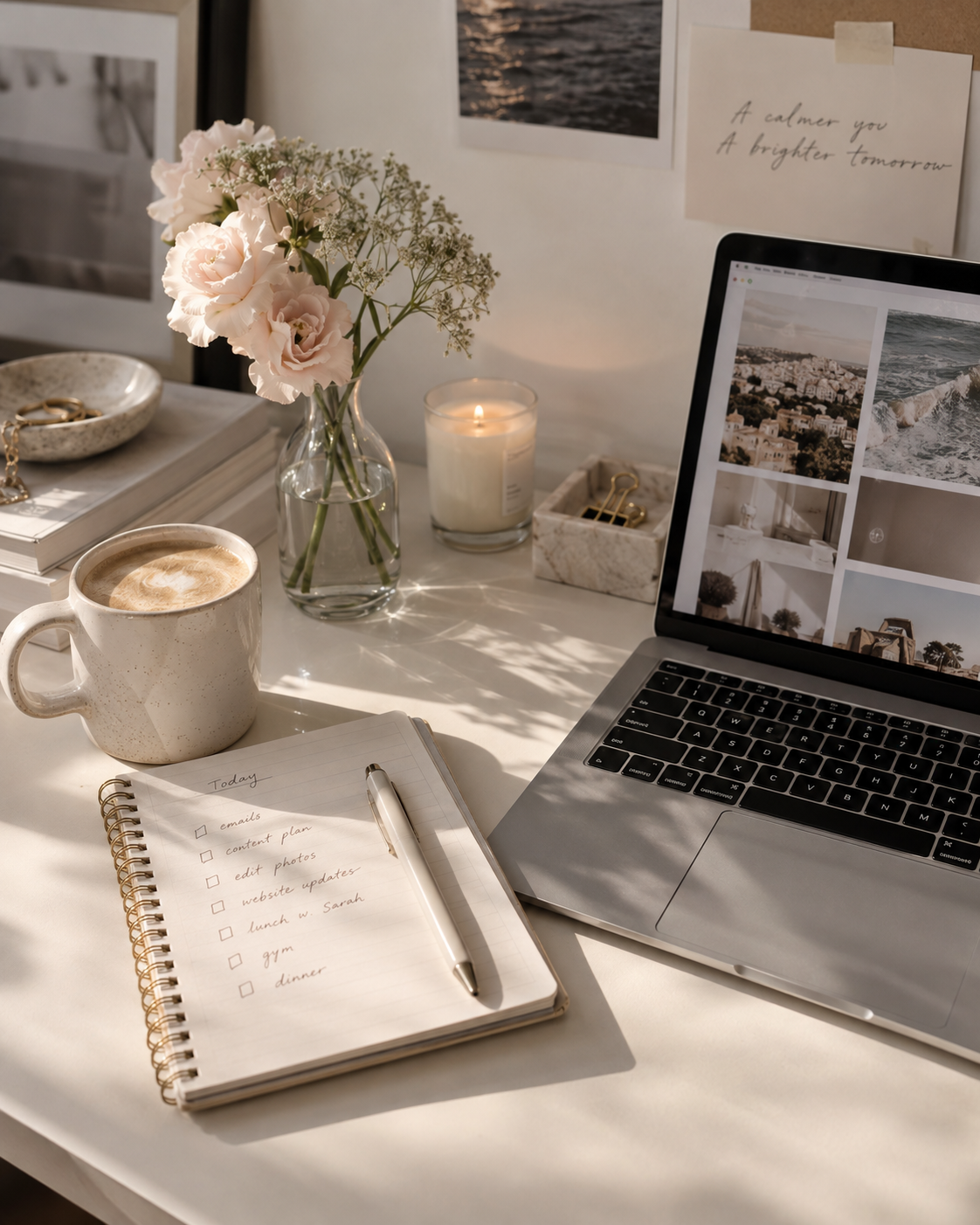 Open notebook and laptop in a calm, sunlit workspace